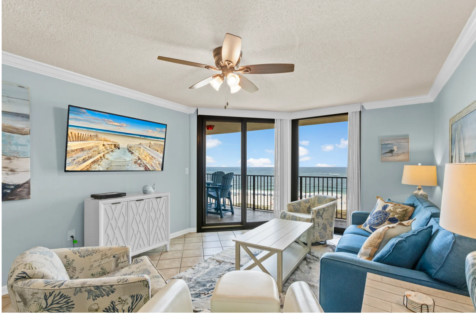 Living room and balcony with Gulf views at Phoenix VII 7916