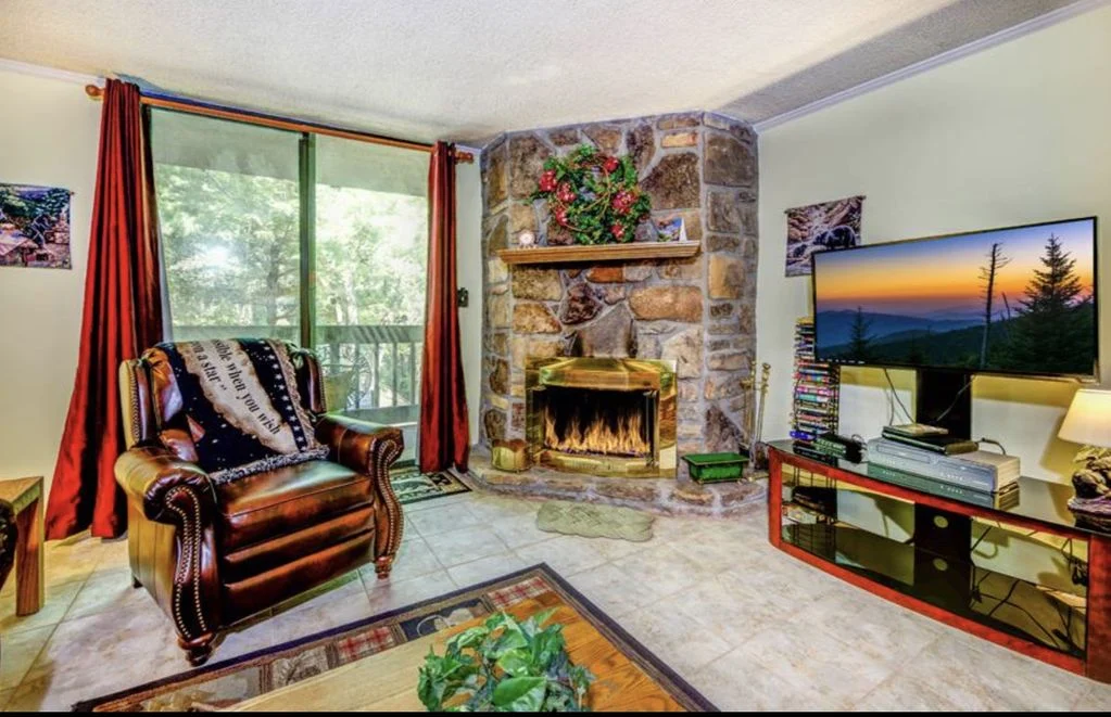 Village Stream condo balcony beside a mountain stream