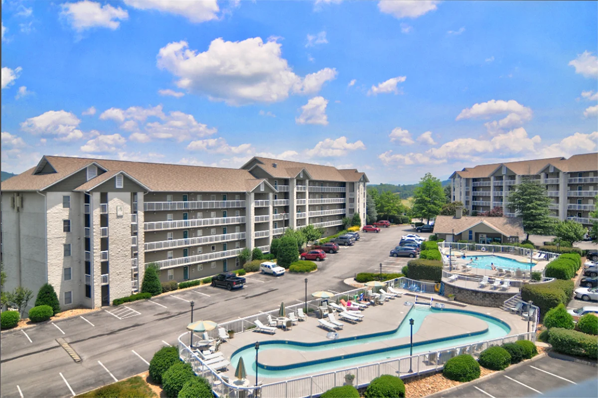 Whispering Pines resort aerial view with lazy river pool